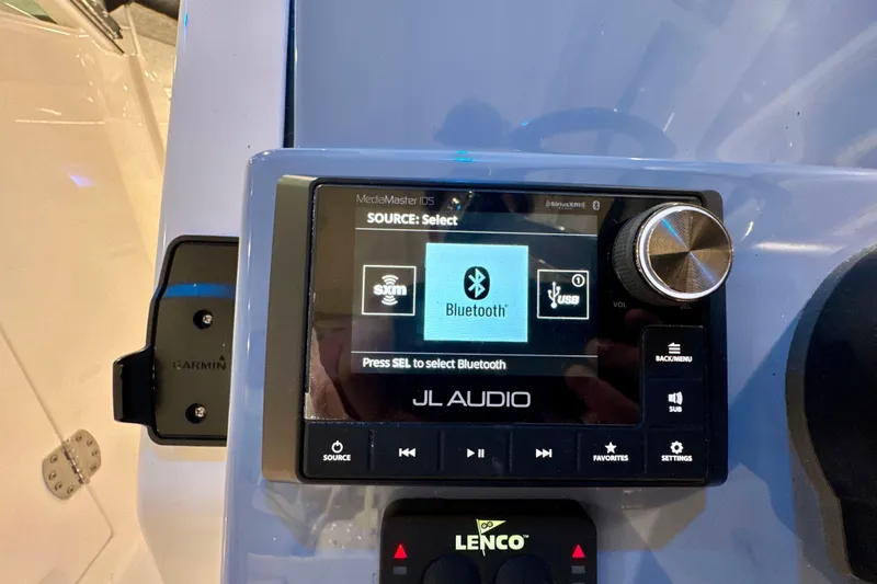  Yacht Photos Pics 2024 Pursuit DC 266 Dual Console boat audio system with Bluetooth connectivity display.