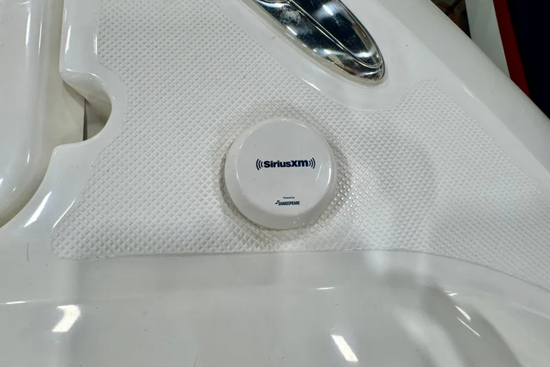  Yacht Photos Pics SiriusXM antenna on 2024 Pursuit DC 266 Dual Console boat, featuring textured white surface.