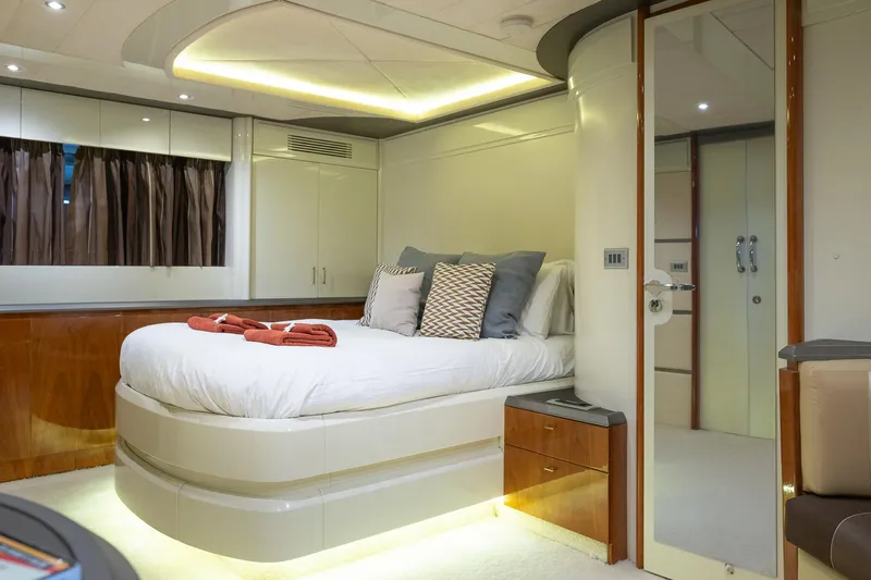  Yacht Photos Pics Luxurious bedroom interior of 1996 Mochi Craft 25 Mega yacht with modern design.
