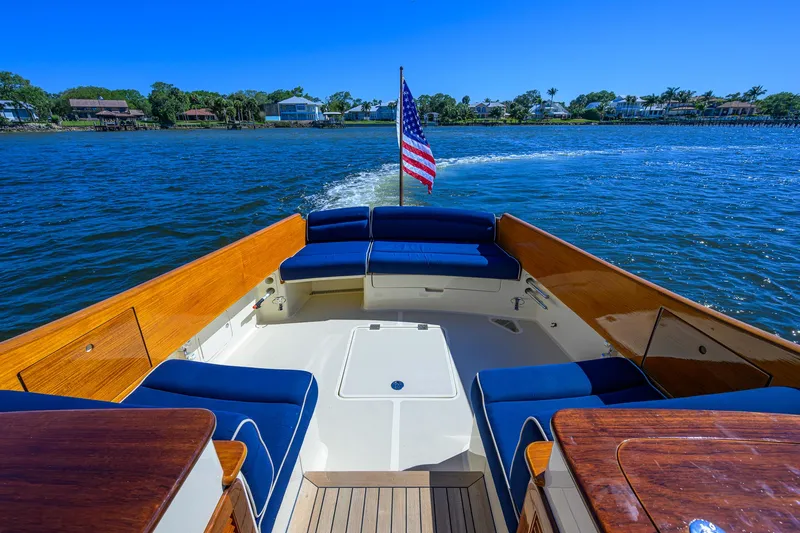 Cara Mia Yacht Photos Pics Hinckley Picnic Boat 37 MKIII, 2010, cruising on a sunny day with American flag.