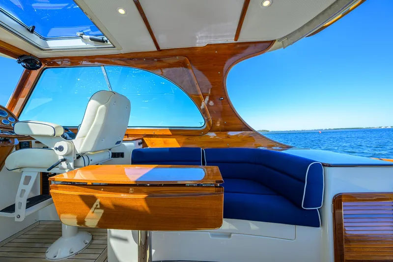 Cara Mia Yacht Photos Pics Luxurious interior of 2010 Hinckley Picnic Boat 37 MKIII with ocean view.