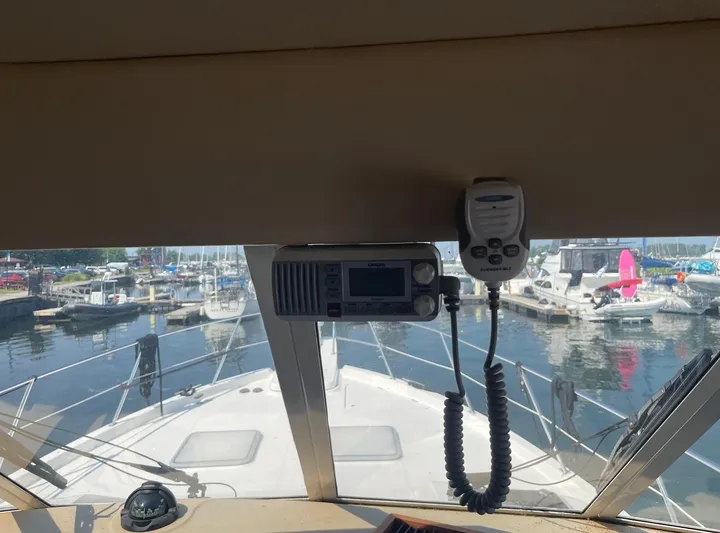  Yacht Photos Pics 2005 Meridian 490 Pilothouse interior view with marina in background.