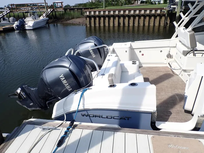 2022 World Cat 325 Dc Yacht Photos Pics 2022 World Cat 325 DC boat with Yamaha engines docked at marina.