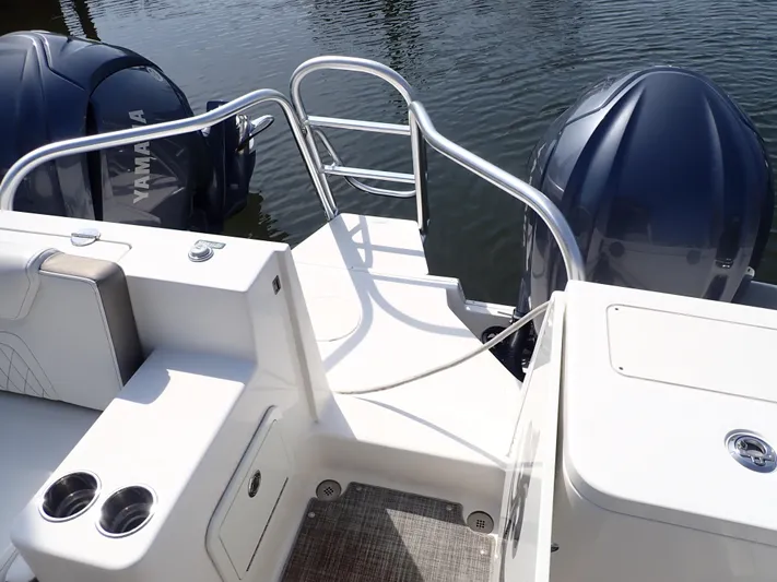 2022 World Cat 325 Dc Yacht Photos Pics 2022 World Cat 325 DC boat with dual Yamaha engines and sleek deck design.