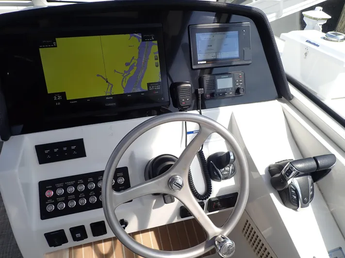 2022 World Cat 325 Dc Yacht Photos Pics Cockpit of 2022 World Cat 325 DC with navigation and control systems.