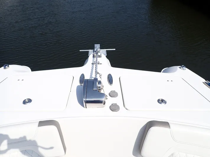 2022 World Cat 325 Dc Yacht Photos Pics Bow of 2022 World Cat 325 DC boat with anchor and storage compartments.