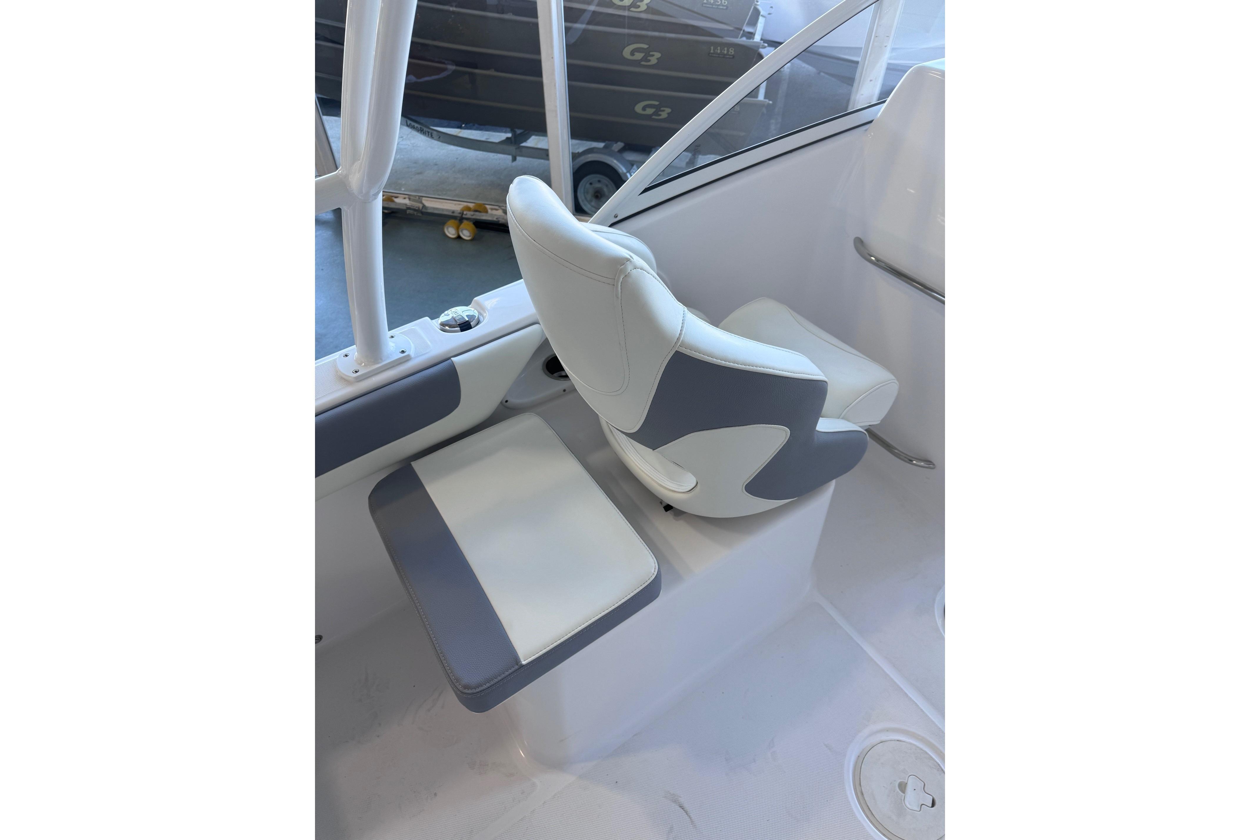 2023 Release 230 DC boat interior with white and gray seating.