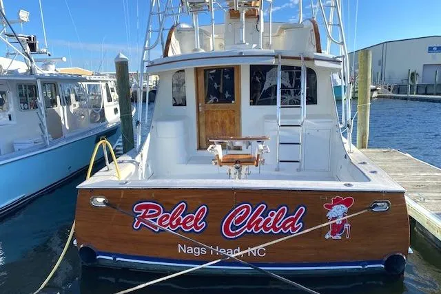 Rebel Child Yacht Photos Pics 1988 Buddy Davis 47 Custom Carolina boat docked, named "Rebel Child," Nags Head, NC.