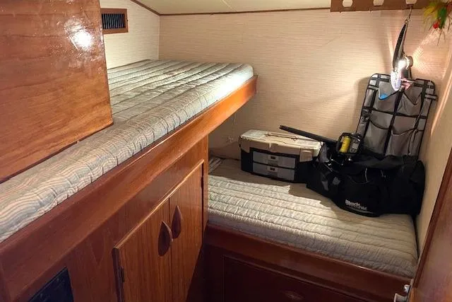 Rebel Child Yacht Photos Pics 1988 Buddy Davis 47 Custom Carolina cabin with bunk beds and storage.