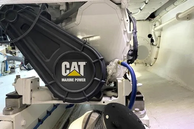 Rebel Child Yacht Photos Pics Engine room of 1988 Buddy Davis 47 Custom Carolina with CAT Marine Power engine.