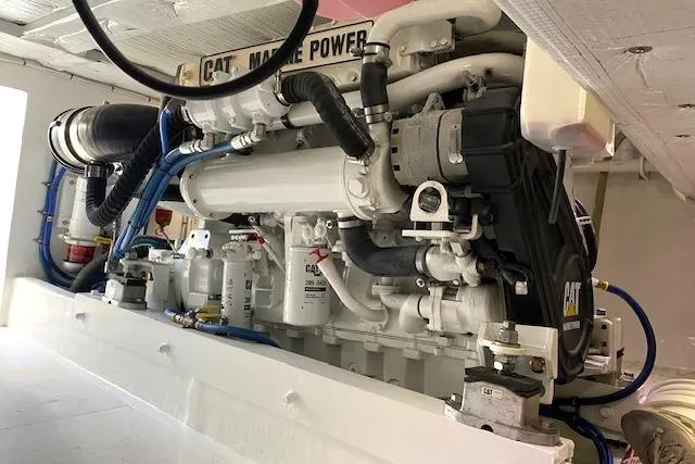 Rebel Child Yacht Photos Pics Engine room of 1988 Buddy Davis 47 Custom Carolina boat with CAT marine power.
