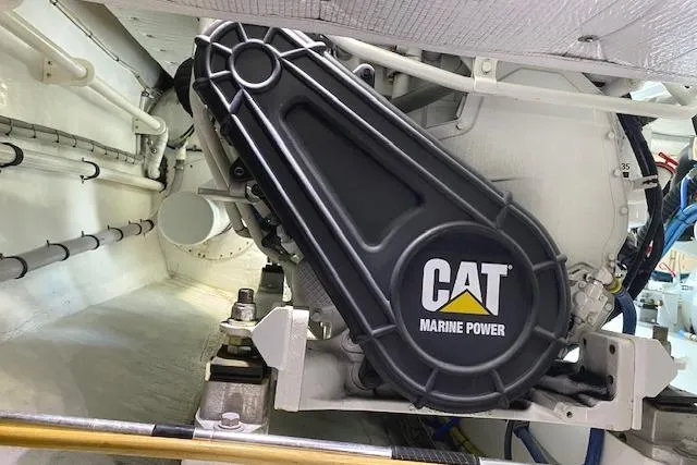 Rebel Child Yacht Photos Pics Engine room of 1988 Buddy Davis 47 Custom Carolina with CAT Marine Power.