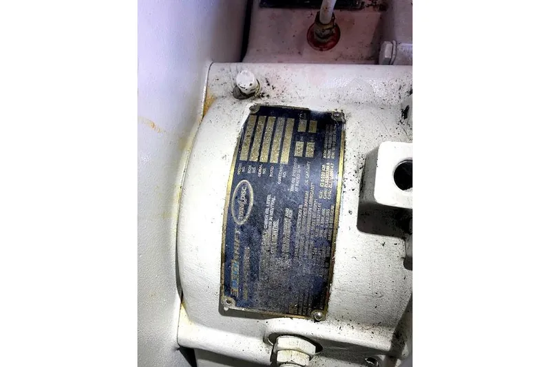 Rebel Child Yacht Photos Pics Engine component of 1988 Buddy Davis 47 Custom Carolina boat with identification plate.