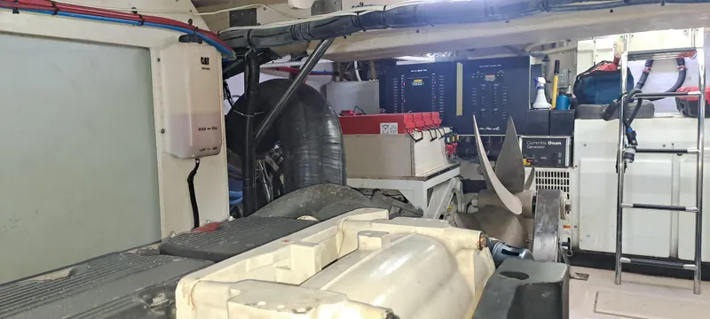 Zen Yacht Photos Pics Engine room of 2015 Sea Ray L650 Fly yacht with equipment and machinery.