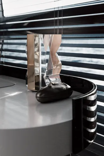  Yacht Photos Pics Modern interior detail of 2025 Azimut Grande 27M yacht with sleek decor and window blinds.