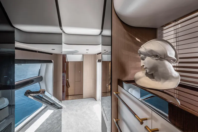  Yacht Photos Pics Luxurious interior of 2025 Azimut Grande 27M yacht with elegant decor and ocean view.