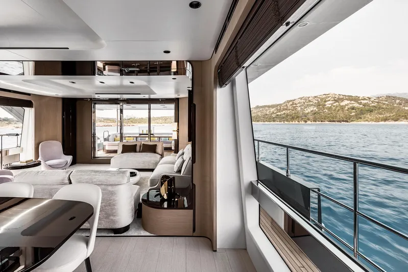  Yacht Photos Pics Luxurious interior of 2025 Azimut Grande 27M yacht with ocean view.