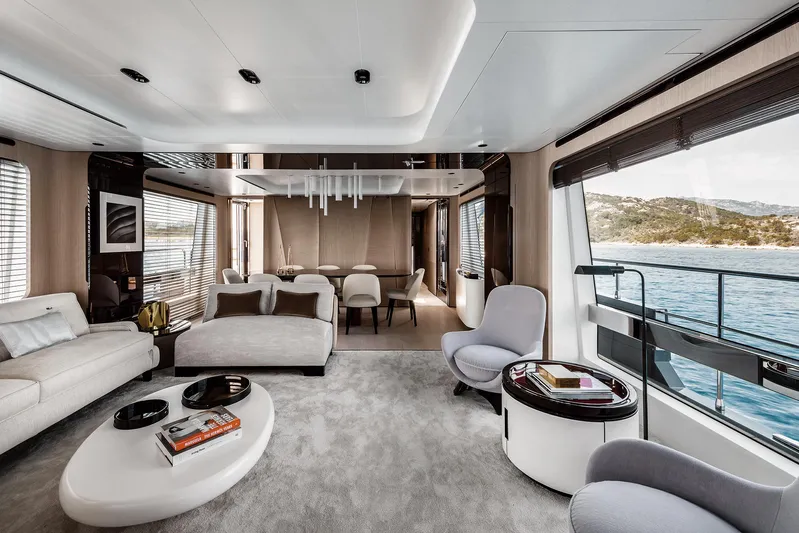  Yacht Photos Pics Luxurious interior of 2025 Azimut Grande 27M yacht with modern furnishings and ocean view.