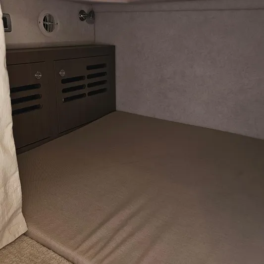  Yacht Photos Pics Interior cabin of 2013 Sea Ray 310 Sundancer with storage compartments.