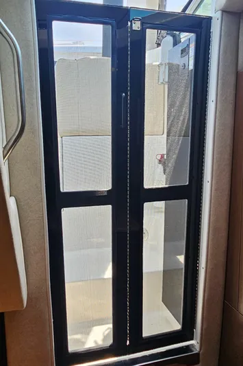  Yacht Photos Pics Sliding glass door on 2013 Sea Ray 310 Sundancer yacht interior.