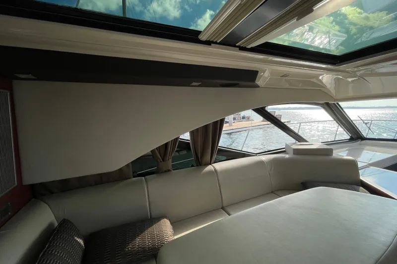  Yacht Photos Pics Luxurious interior of 2013 Sea Ray 510 Sundancer yacht with waterfront view.