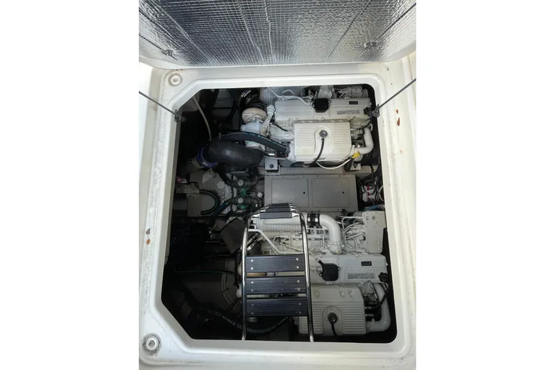  Yacht Photos Pics Engine compartment of 2013 Sea Ray 510 Sundancer yacht, showcasing dual engines.