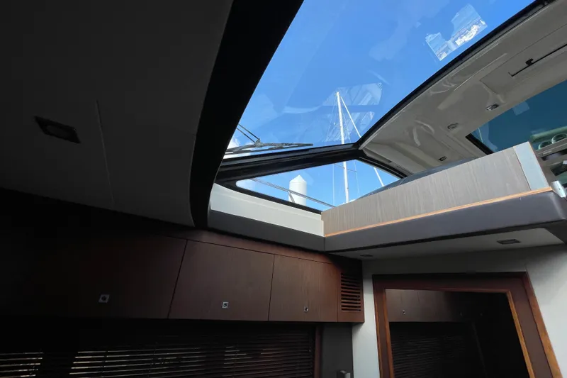  Yacht Photos Pics Interior view of 2013 Sea Ray 510 Sundancer yacht with open sunroof.