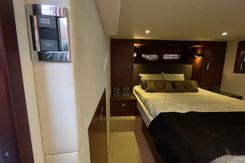  Yacht Photos Pics Luxurious stateroom interior of 2013 Sea Ray 510 Sundancer yacht with elegant bedding.