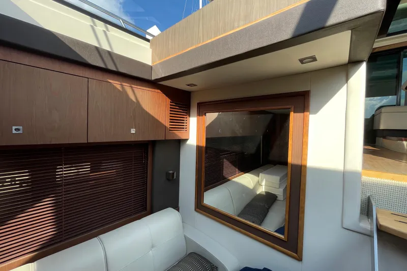  Yacht Photos Pics Interior of 2013 Sea Ray 510 Sundancer yacht with modern wood and leather design.