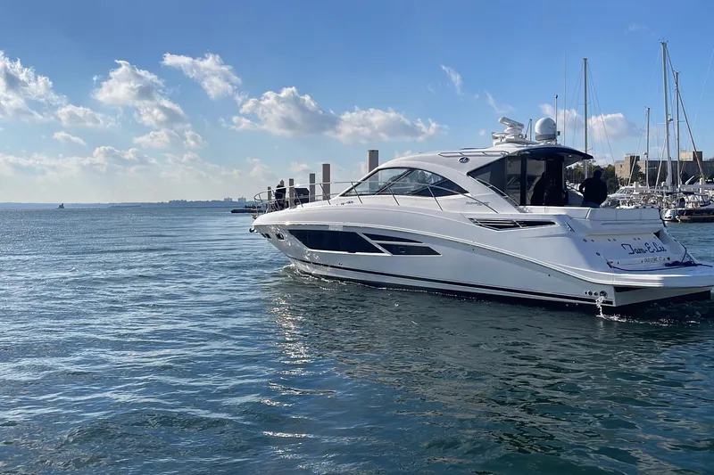  Yacht Photos Pics 2013 Sea Ray 510 Sundancer yacht cruising on a sunny day.