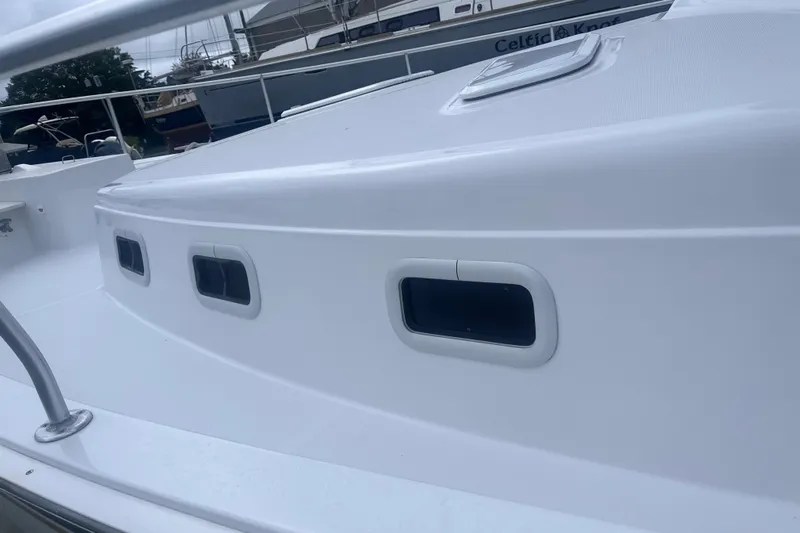  Yacht Photos Pics 2000 Mainship 43 Trawler Aft Cabin, white exterior with windows, docked at marina.