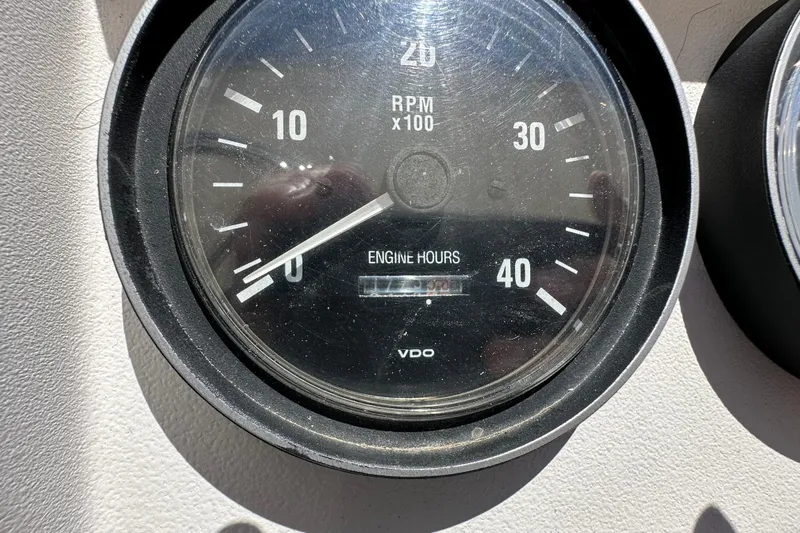  Yacht Photos Pics Close-up of a Mainship 43 Trawler Aft Cabin tachometer, showing RPM and engine hours.