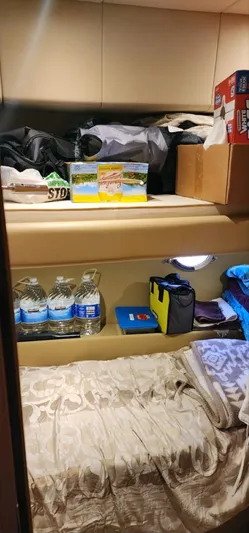 River Rat Yacht Photos Pics Cozy cabin interior of 2013 Azimut 45 Flybridge with storage and essentials.