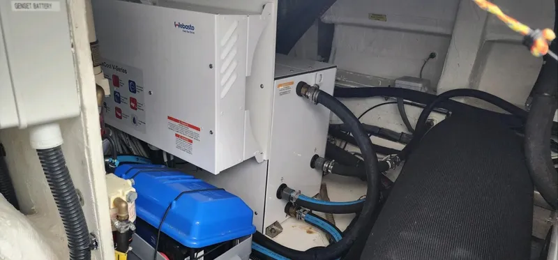 River Rat Yacht Photos Pics Engine room of 2013 Azimut 45 Flybridge with mechanical components and wiring.