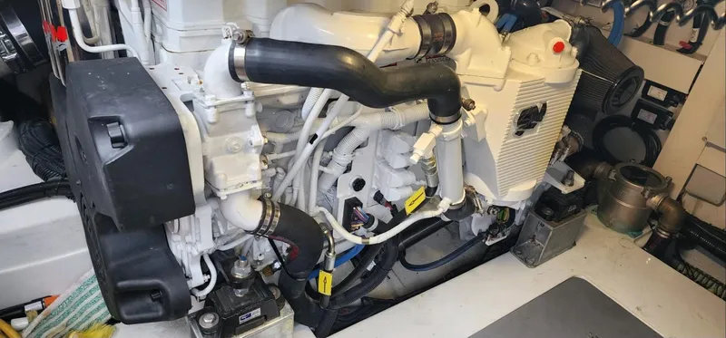 River Rat Yacht Photos Pics Engine room of 2013 Azimut 45 Flybridge yacht, showcasing detailed mechanical components.