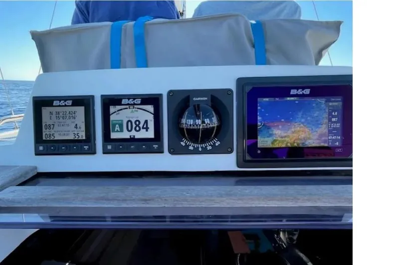  Yacht Photos Pics Navigation instruments on a 2016 Hanse 315 sailboat dashboard, featuring B&G displays and compass.