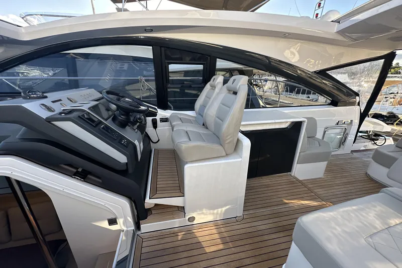  Yacht Photos Pics 2021 Fairline Targa 45 Open yacht interior with modern helm and seating.