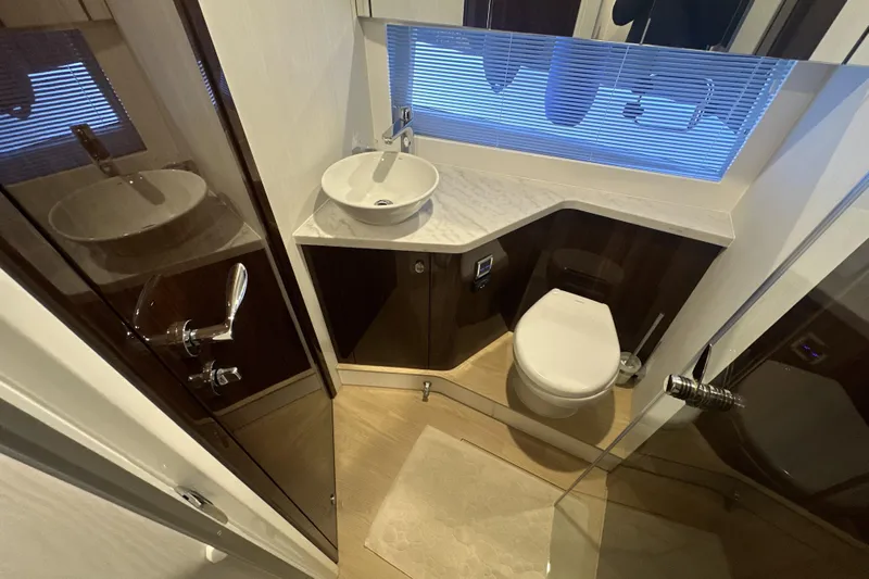  Yacht Photos Pics Luxurious bathroom in 2021 Fairline Targa 45 Open yacht with modern fixtures.