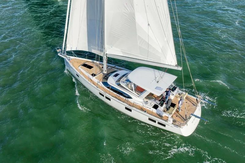 No Retreat Yacht Photos Pics Sailing yacht Hylas H57 2020 gliding on open sea with full sails.