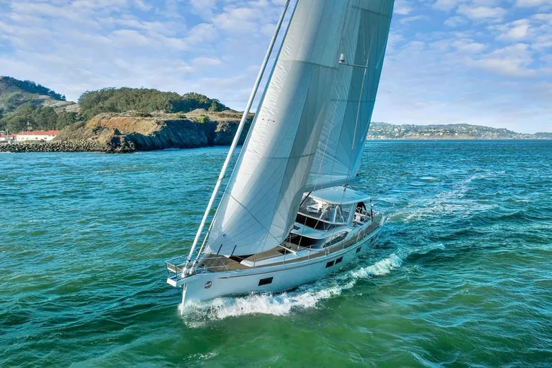 No Retreat Yacht Photos Pics Sailing yacht Hylas H57, 2020 model, cruising in scenic coastal waters.