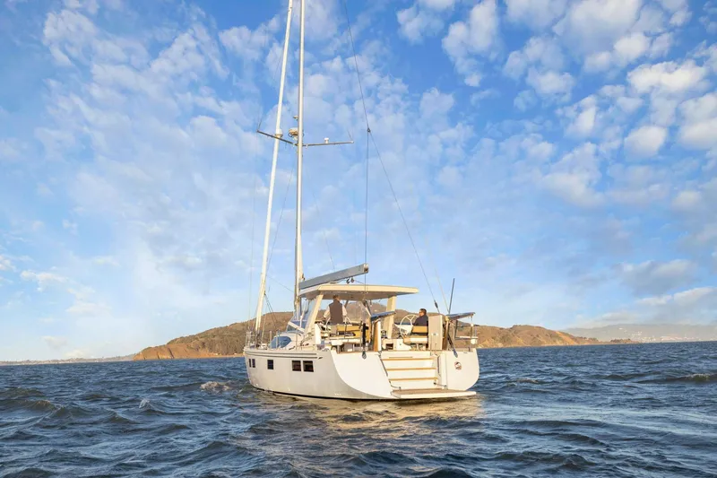 No Retreat Yacht Photos Pics Sailing yacht Hylas H57 (2020) on open water under a blue sky.
