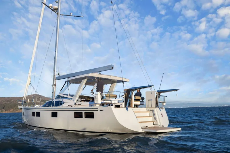 No Retreat Yacht Photos Pics Sailing yacht Hylas H57 2020 on open water under blue sky.