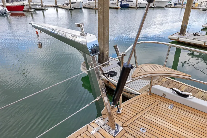 No Retreat Yacht Photos Pics Sleek 2020 Hylas H57 yacht deck with polished metal fittings at marina.