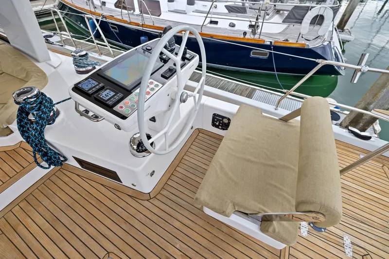 No Retreat Yacht Photos Pics Helm station of 2020 Hylas H57 yacht with navigation equipment and teak decking.