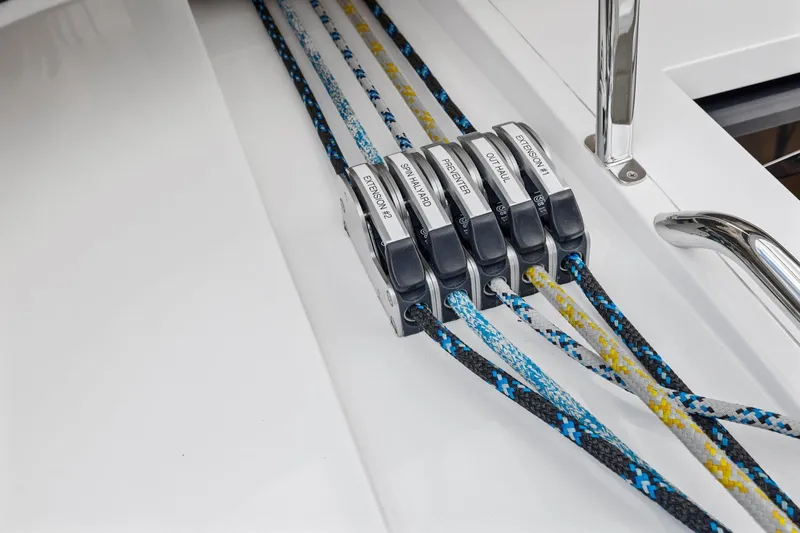 No Retreat Yacht Photos Pics Close-up of Hylas H57 2020 sailboat rope clutches with colorful lines.