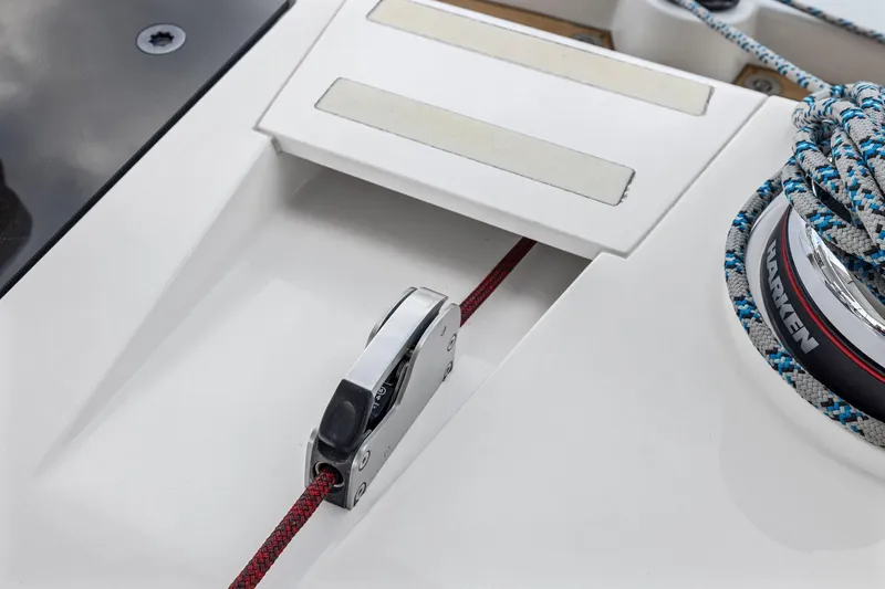 No Retreat Yacht Photos Pics Close-up of Hylas H57 sailboat deck, featuring winch and rope system, 2020 model.