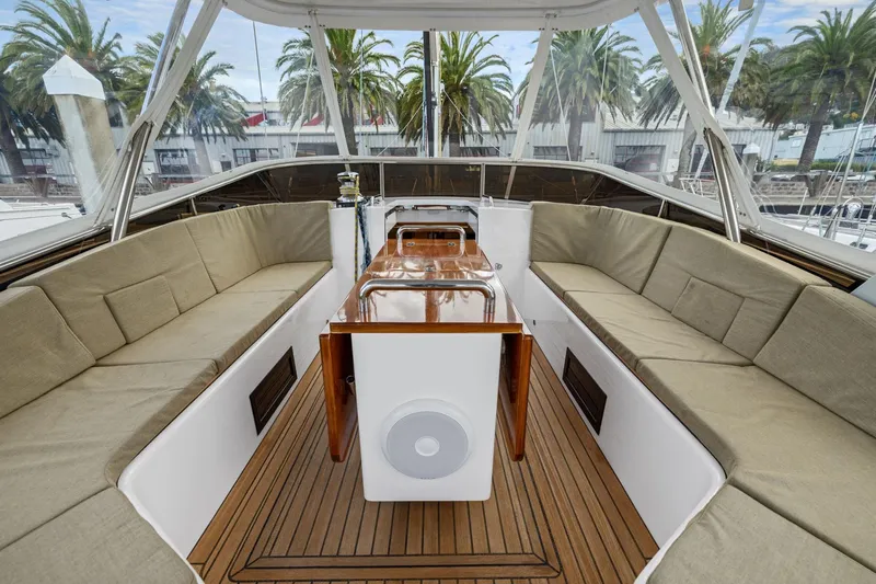 No Retreat Yacht Photos Pics Luxurious 2020 Hylas H57 yacht interior with elegant seating and wooden accents.