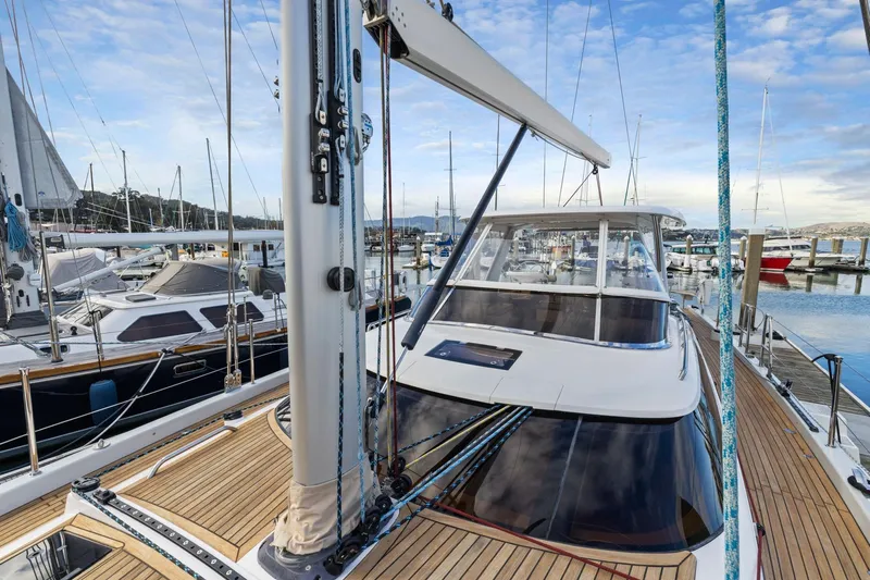 No Retreat Yacht Photos Pics 2020 Hylas H57 yacht docked at marina, showcasing sleek design and wooden deck.