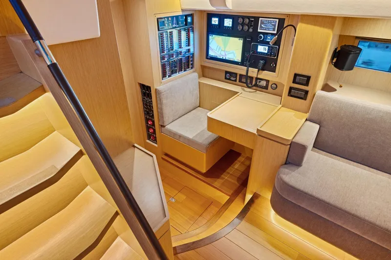 No Retreat Yacht Photos Pics Modern navigation station in 2020 Hylas H57 yacht with wood interior and advanced electronics.