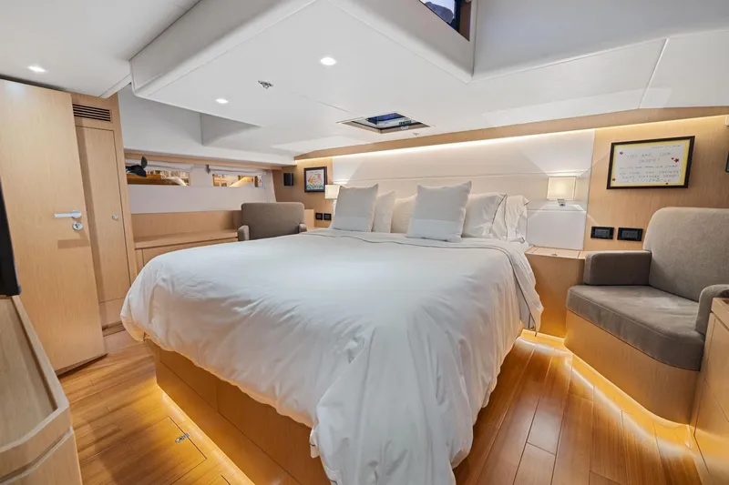 No Retreat Yacht Photos Pics Luxurious cabin interior of 2020 Hylas H57 yacht with modern design and cozy bedding.